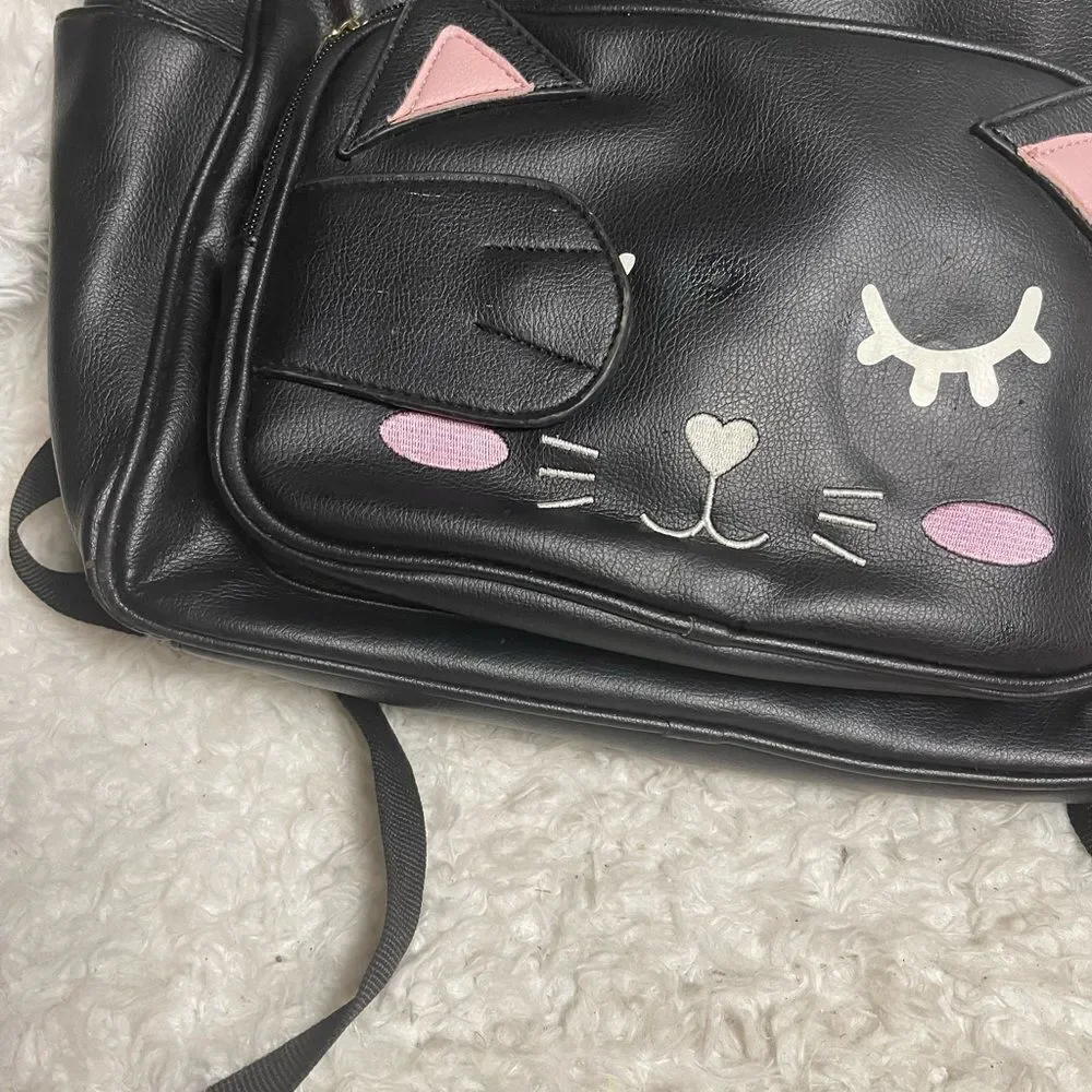 Betsey Johnson synthetic Black Cat Face pick a boo Medium Backpack.